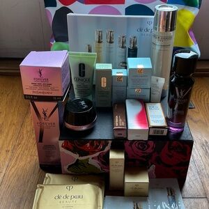 Luxury assortment of cosmetics in a cute beach bag and cosmetic accessory bag